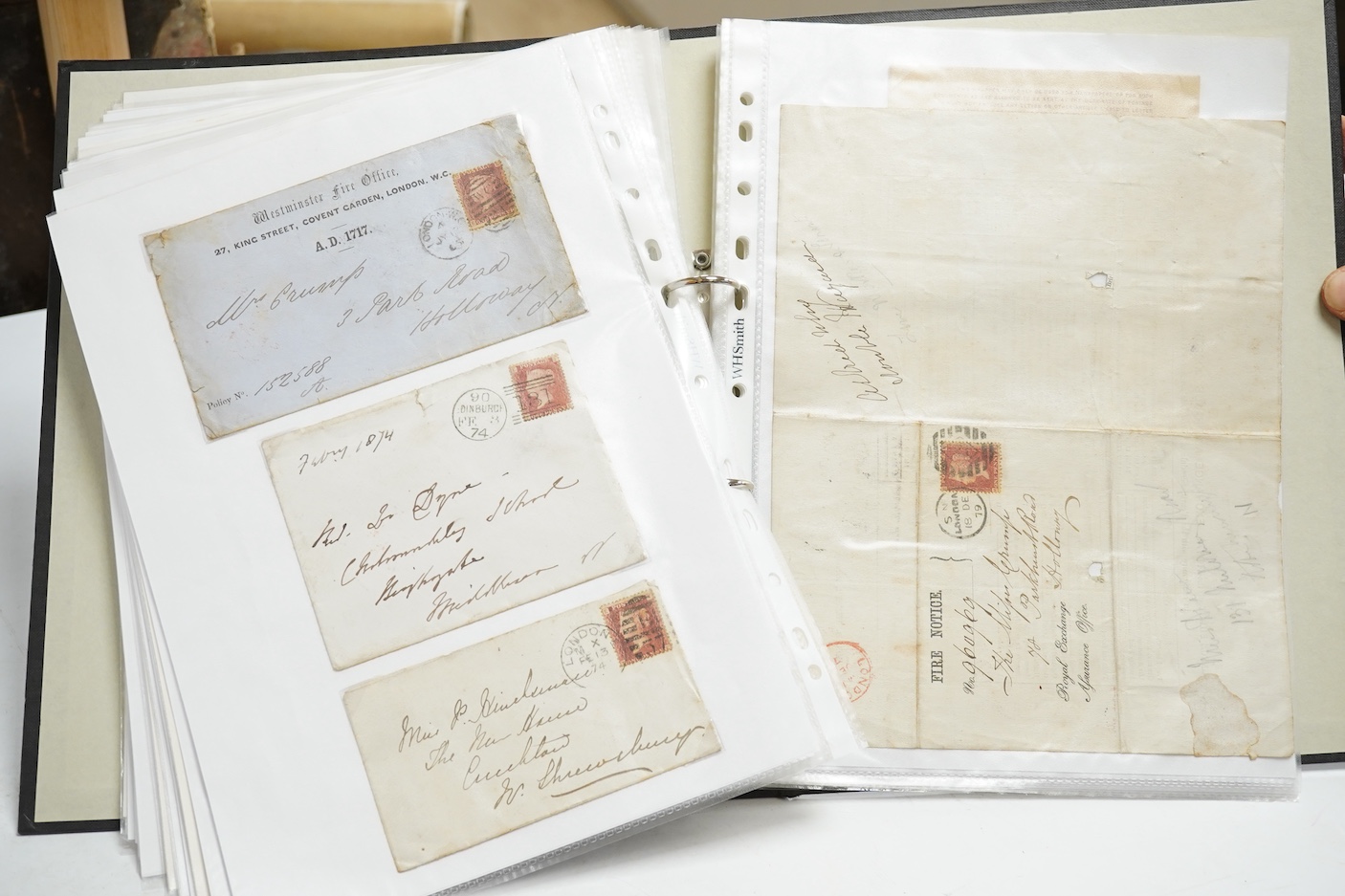 A collection of fifty early nineteenth century Georgian and Victorian franked postal covers, Victoria pre-paid ‘letter cards’ and post cards, railway Dividend Statement, Registered Letters, Fire Office statements, letter